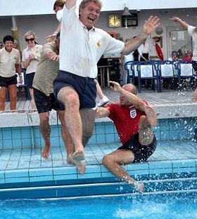 NCL Cruise Director jumping in the ship's pool